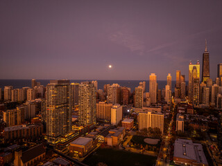 Aerial View of Chicago Skyline with Lake Michigan in the Background at Sunset”