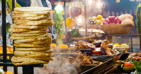 Explore an enticing selection of meats, sausages, and other products in a market. Perfect for holiday meals, this array offers inspiration for your cooking endeavors.