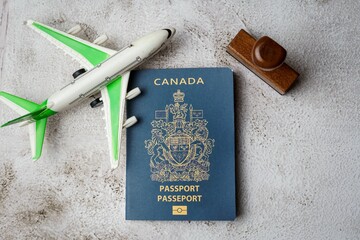 Canadian passport stamp and airline. Holiday and business travel concept