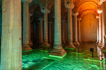 Ancient underground cistern with illuminated columns and vaulted ceilings
