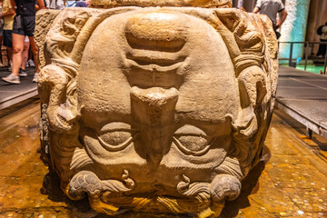 Ancient medusa head column base at basilica cistern in istanbul