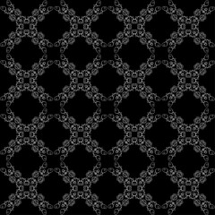 A gray lace pattern on a black background. Seamless texture for fabric or wallpaper.