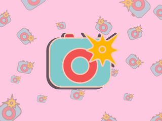 Colorful flat-style camera icon with a bright flash on a pastel pink background, perfect for creative design, social media graphics, photography themes, and modern digital content.