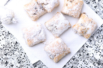 Stollen Bites on bright background. Soft focus. Close up. Copy space	