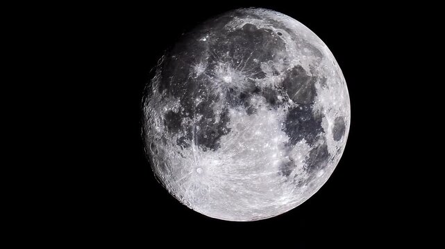 Majestic full moon slowly zooming in against the deep black of space, revealing intricate details of its craters and surface texture in a highly detailed astronomical view of our natural satellite