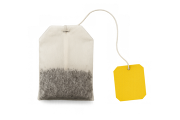 Tea bag with blank yellow label and string