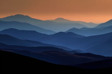 Obraz premium Stunning Abstract Sunset Over Mountain Ridges with Rolling Hills and Cloudy Horizon