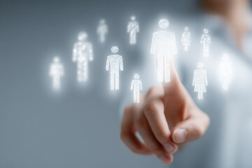 A person using futuristic digital interface to select and connect with abstract human icons representing social networking and data management concepts