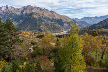 Sallent de Gallego and the empty reservoir of Lanuza from Formigal in Huesca Aragon Spain autumn view