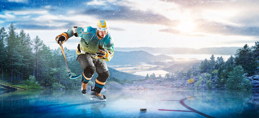 Hockey players in action on the ice. Outdoor game. Sports. Hockey match. A large hockey rink in the middle of an forest. Hockey concept. Panorama