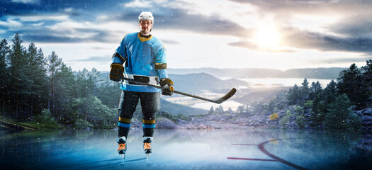 Hockey players in action on the ice. Outdoor game. Sports. Hockey match. A large hockey rink in the middle of an forest. Hockey concept. Panorama