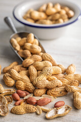 Peanuts in shell. Groundnuts on kitchen table.
