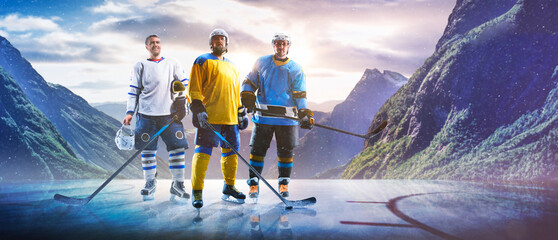 Hockey players in action on the ice. Outdoor game. Sports. Hockey match. A large hockey rink in the middle of an forest. Hockey concept. Panorama