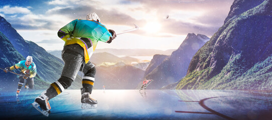 Hockey players in action on the ice. Outdoor game. Sports. Hockey match. A large hockey rink in the middle of an forest. Hockey concept. Panorama