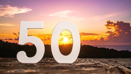 Celebrating 50 Years: Sunset Backdrop with Number Fifty.