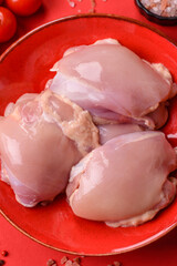 Chicken thigh fillet, skinless and boneless meat for grilling or barbecue. Chicken thigh fillet