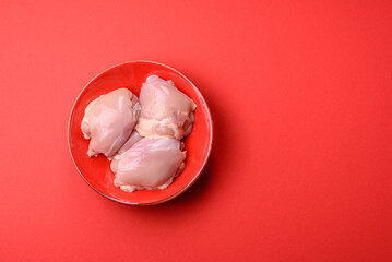 Chicken thigh fillet, skinless and boneless meat for grilling or barbecue. Chicken thigh fillet