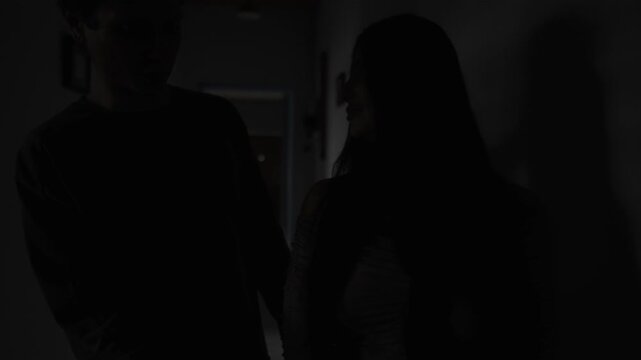 Jealous husband trying to grab wife phone, relationship distrust and conflict at home