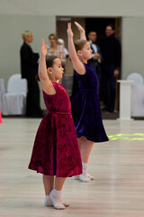 Children compete in ballroom dancing tournament