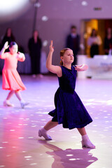 Children compete in ballroom dance competition event