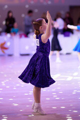 Children competing in ballroom dance event