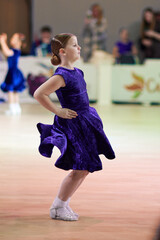 Kids compete in ballroom dance competition