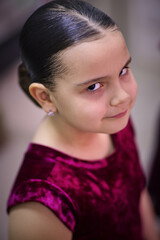 Young dancer preparing for a ballroom competition