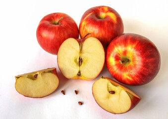 Several whole and sliced ​​apples