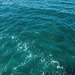 Obraz premium Majestic, powerful ocean surface texture featuring swirling deep aqua and turquoise colors in motion, capturing the refreshing feel of the sea ,serene ,motion ,wave