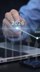 Virtual touchscreen with rising 2026 business graph. Vertical 9:16 video