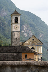 Lavertezzo, Switzerland - August 14, 2025: Beautiful village Lavertezzo and the crystal clear and calm waters of the Verzasca stream. A popular tourist destination in Ticino, Switzerland.