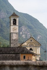 Lavertezzo, Switzerland - August 14, 2025: Beautiful village Lavertezzo and the crystal clear and calm waters of the Verzasca stream. A popular tourist destination in Ticino, Switzerland.