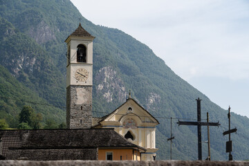 Lavertezzo, Switzerland - August 14, 2025: Beautiful village Lavertezzo and the crystal clear and calm waters of the Verzasca stream. A popular tourist destination in Ticino, Switzerland.