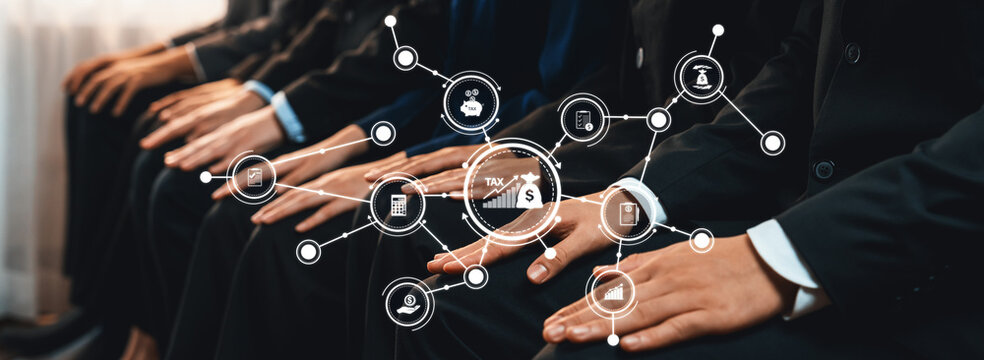 A business meeting scene featuring hands of professionals engaged in discussions, overlaid with icons symbolizing financial concepts, collaboration, and technology. Amity - Powered by Adobe