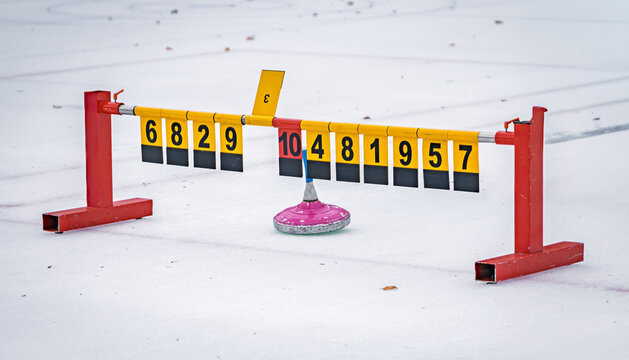 Traditional Swiss winter game, Eisstock sport on an ice rink, Zurich Switzerland