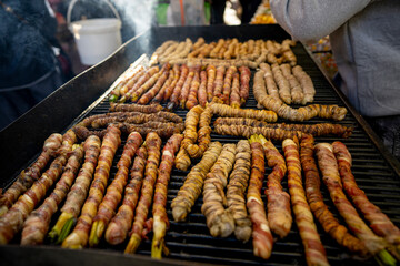 Delicious Italian grilled food being prepared at an outdoor market