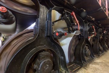 The dry paper web enters the drying section, which consists of steam-heated cylinders.