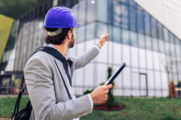 Civil Engineer Inspecting Completed Building