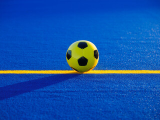 Soccer ball and dividing lines on the field. Football. Active sports. Team sports. Stadium training. Sports equipment. Background, wallpaper.