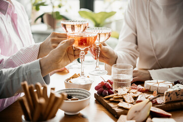 Glasses of rose wine seen during a dinner party of a celebration.