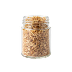 Cereal squares in glass jar against black background perfect for breakfast concept photography