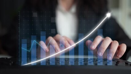 A business professional focuses on analyzing data and trends using digital graphs and charts, highlighting growth and opportunities in a modern office setting. Copula - Powered by Adobe