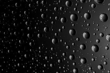 Abstract background texture drops of water and art light on glass. Creative space design