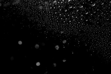 Abstract background texture drops of water and art light on glass. Creative space design