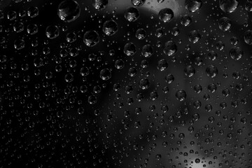 Abstract background texture drops of water and art light on glass. Creative space design