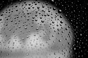 Abstract background texture drops of water and art light on glass. Creative space design