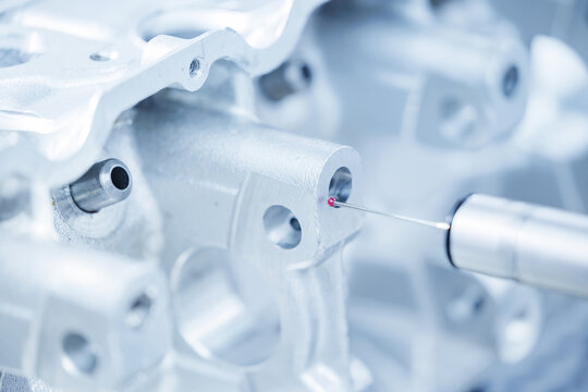 High-precision cnc coordinate measuring machine inspecting metal component