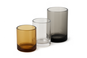 Three drinking glasses in different colors transparent background