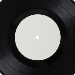 Macro view of a vinyl record displaying a blank white label for customization