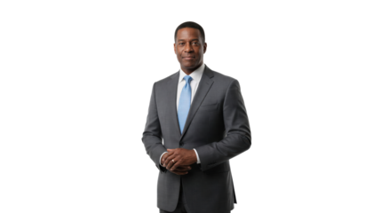 Businessman in formal suit with blue tie isolated
